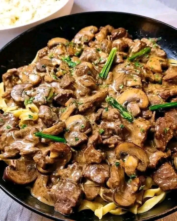Creamy Garlic Beef and Mushroom Stroganoff with Herb Butter Noodles