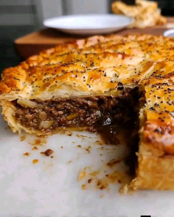 Golden Crusted Homemade Family Meat Pie with Savory Beef Filling